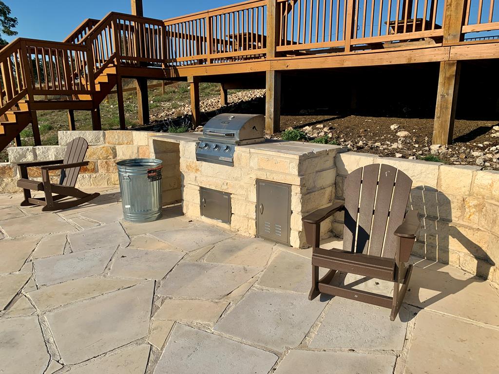 Lot 37 Dancing Sun Road, Unit 37 Fredericksburg, TX 78624 - Photo 13 of 13 a view of a patio with table and chairs