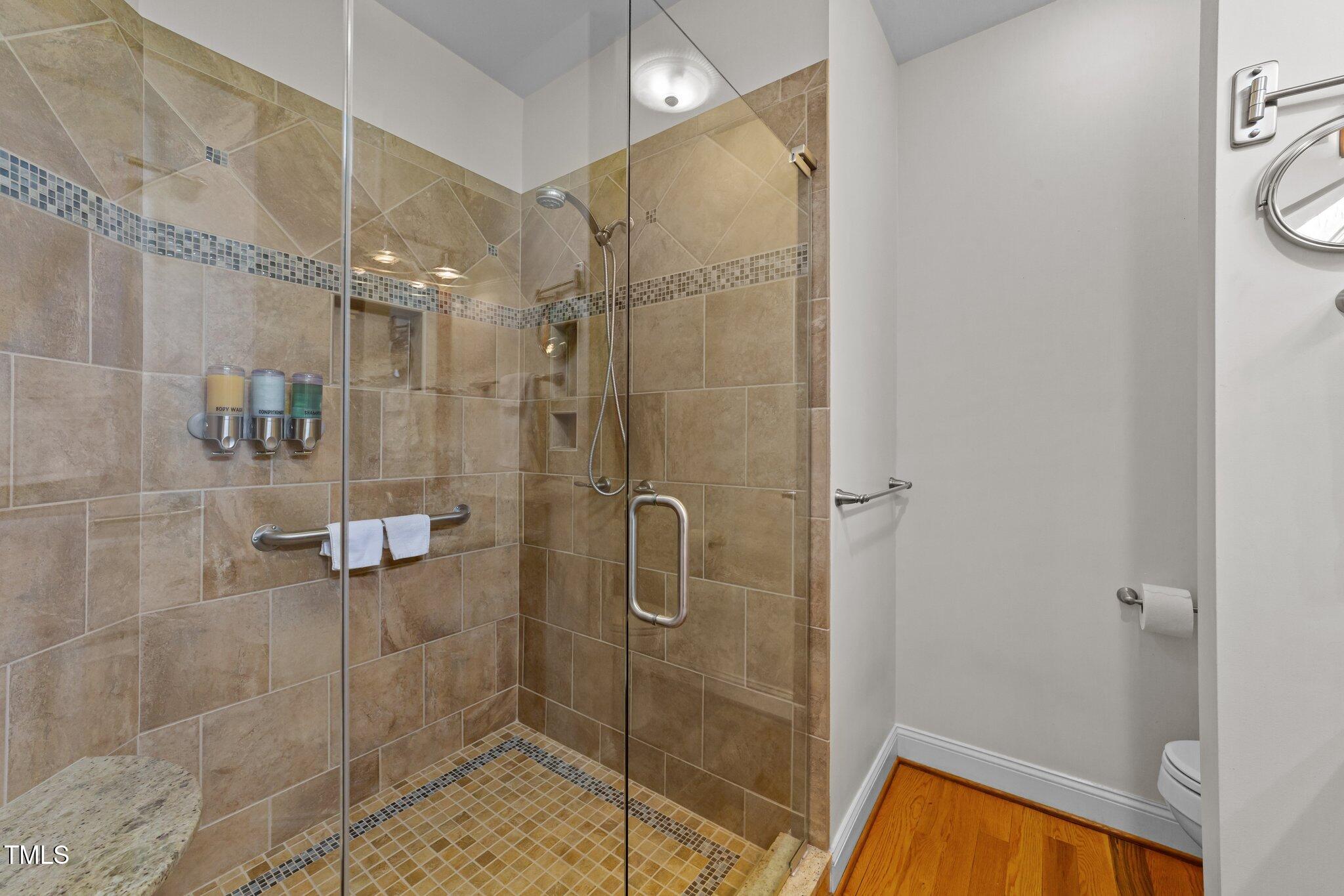 2506 Everett Avenue Raleigh, NC 27607 - Photo 18 of 45 a bathroom with a shower