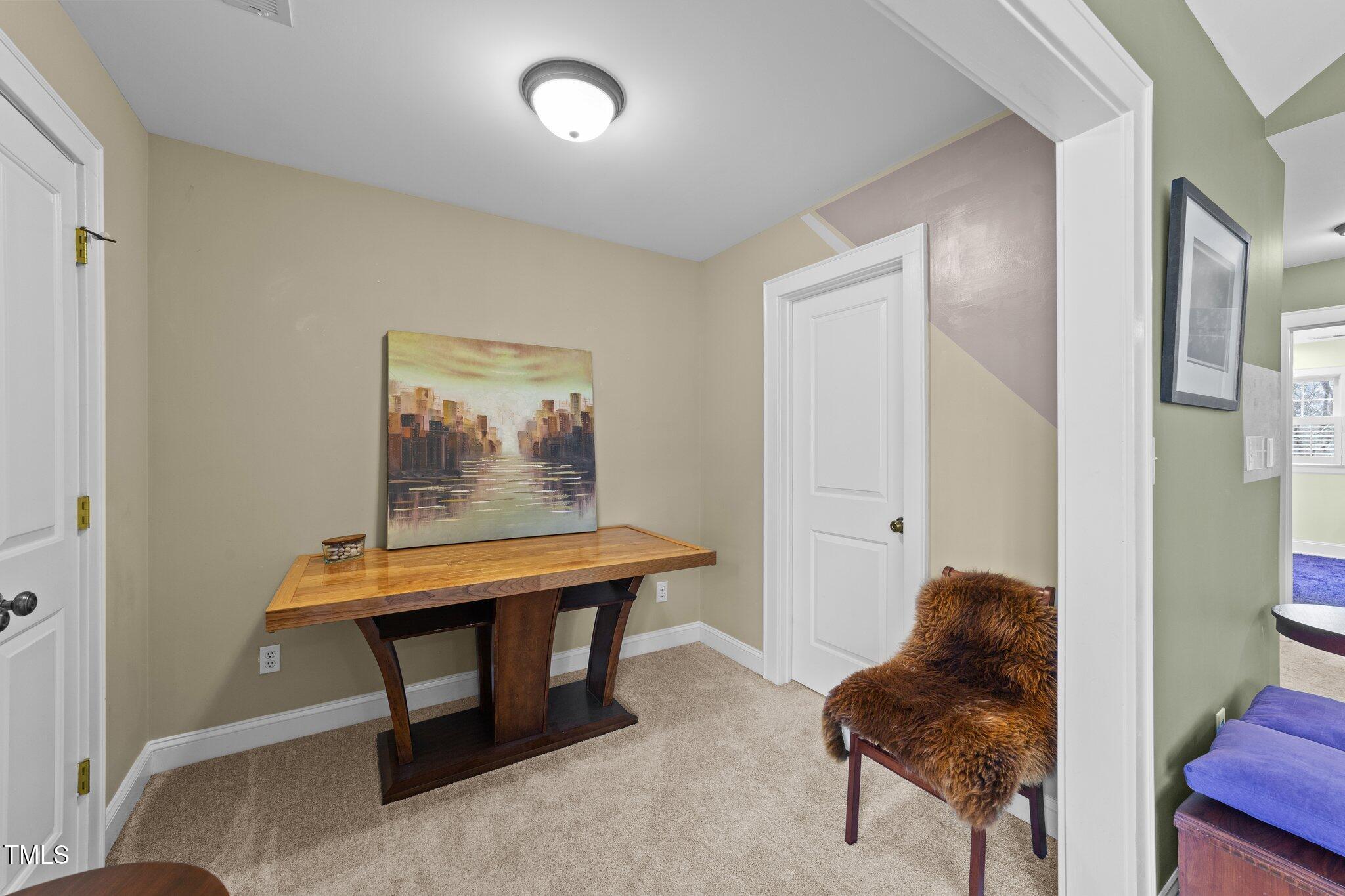 2506 Everett Avenue Raleigh, NC 27607 - Photo 24 of 45 a room with furniture and a window