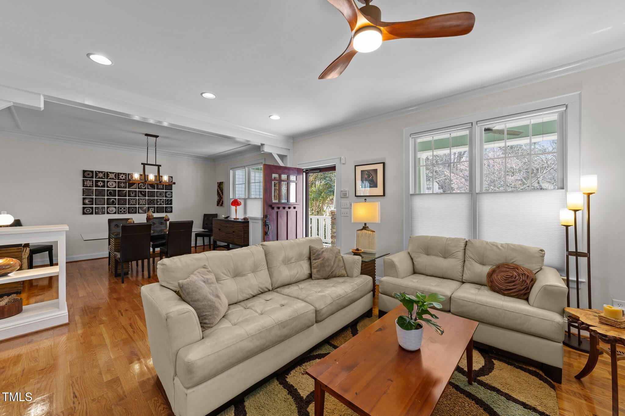 2506 Everett Avenue Raleigh, NC 27607 - Photo 6 of 45 a living room with furniture and a large window