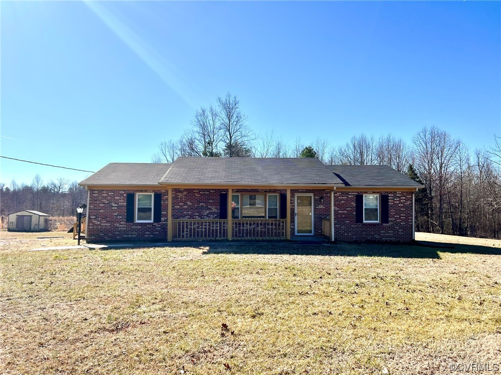 2720 Scuffletown Road Rice, VA 23966 - Photo 19 of 31 a front view of a house with a yard
