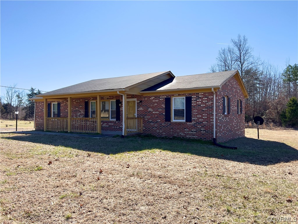 2720 Scuffletown Road Rice, VA 23966 - Photo 24 of 31 a front view of a house with a yard