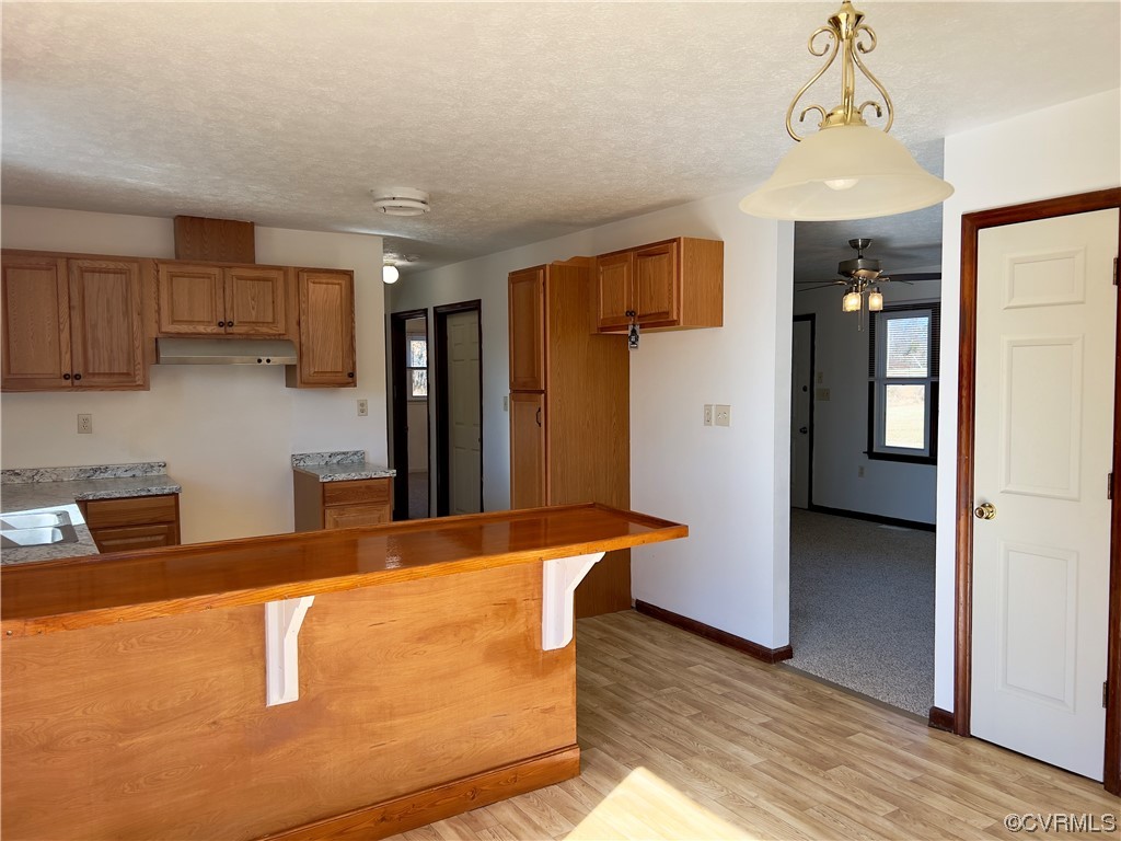 2720 Scuffletown Road Rice, VA 23966 - Photo 6 of 31 a kitchen with stainless steel appliances granite countertop a refrigerator a sink dishwasher and a stove with wooden floor