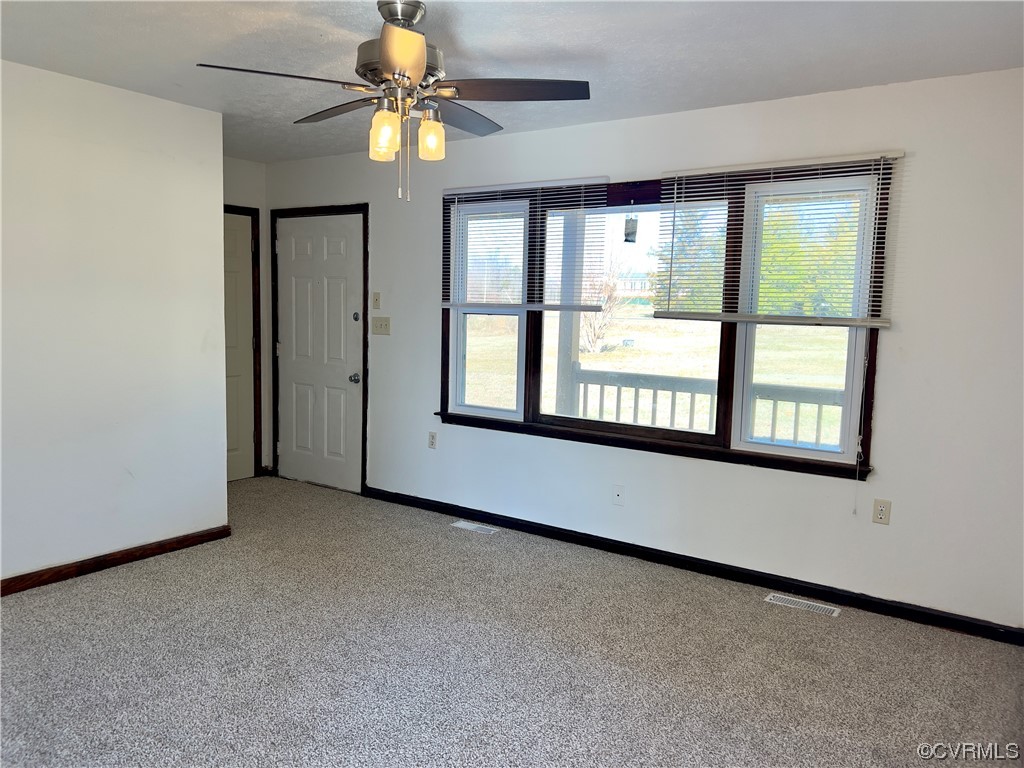 2720 Scuffletown Road Rice, VA 23966 - Photo 9 of 31 wooden floor in an empty room with a window