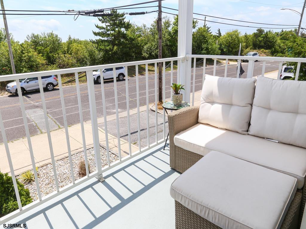 3901 Ocean Avenue, Unit 1 Brigantine, NJ 08203 - Photo 22 of 30 a view of a two chairs in the balcony