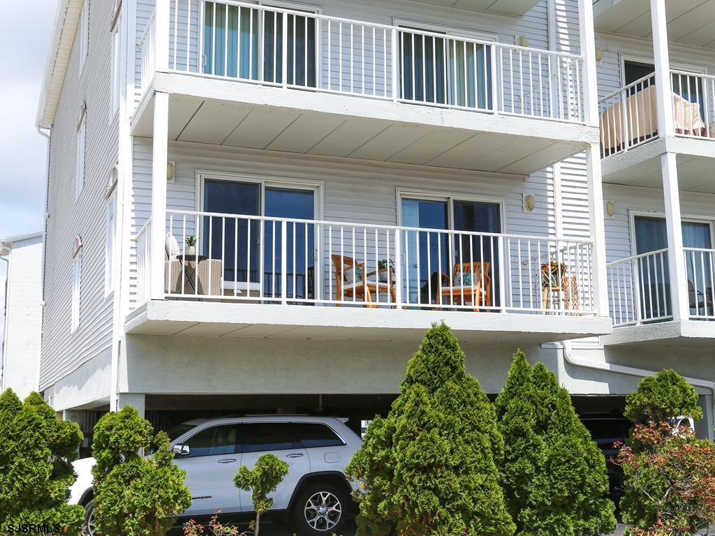 3901 Ocean Avenue, Unit 1 Brigantine, NJ 08203 - Photo 27 of 30 a front view of a house with a garden