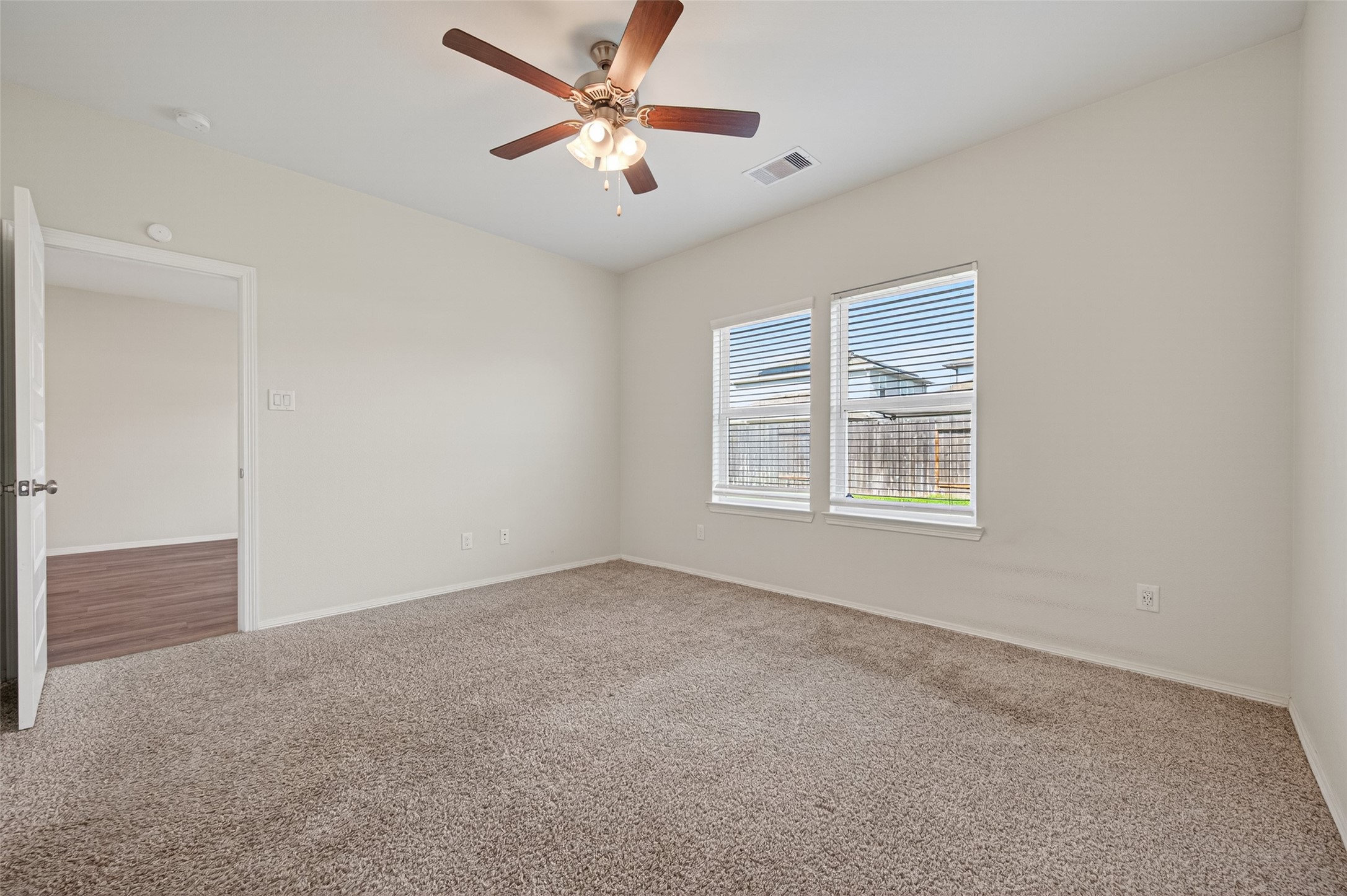 23222 Spring Genesis Lane Katy, TX 77493 - Photo 29 of 43 A spacious primary bedroom filled with natural light.
