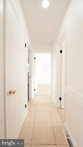 a view of a house with a snow in the yard