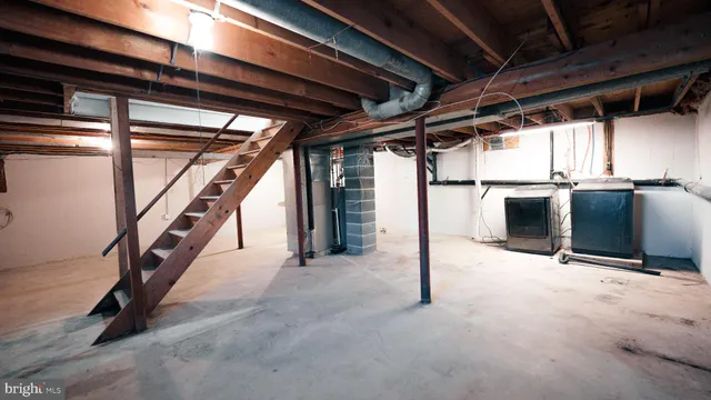 a view of hallway with a black white checkered floor