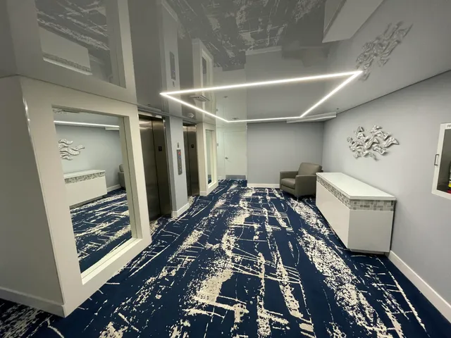 a view of a hallway with washer and dryer