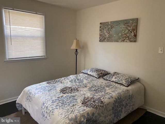 327 West Virginia Road Browns Mills, NJ 08015 - Photo 8 of 13 Serene bedroom with floral accents.