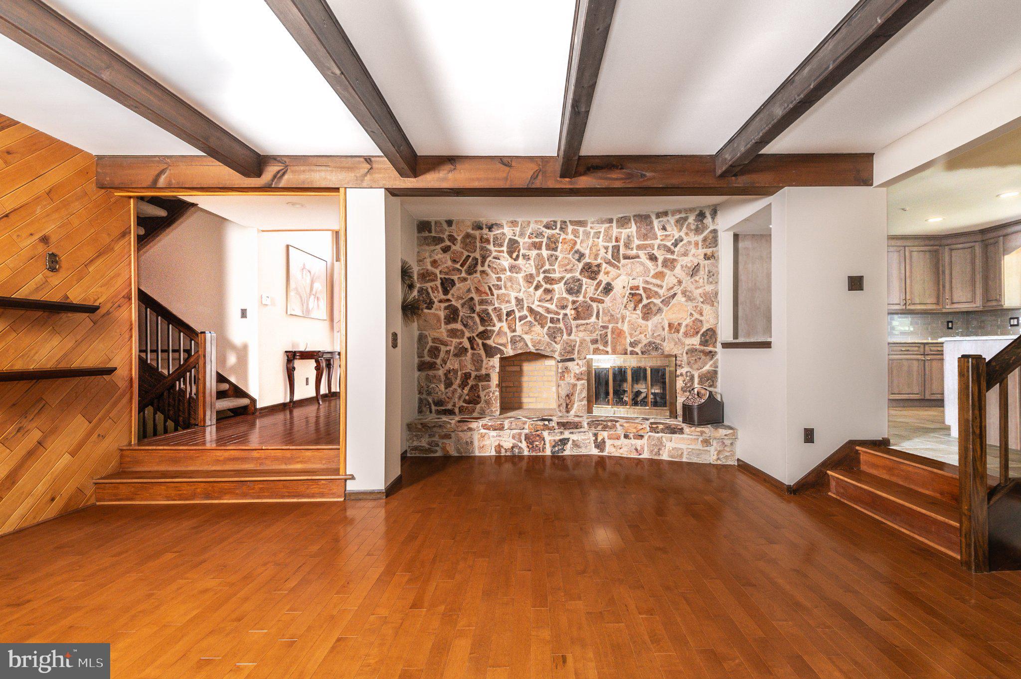 434 4th Street Atco, NJ 08004 - Photo 7 of 69 a view of an empty room with wooden floor and a window