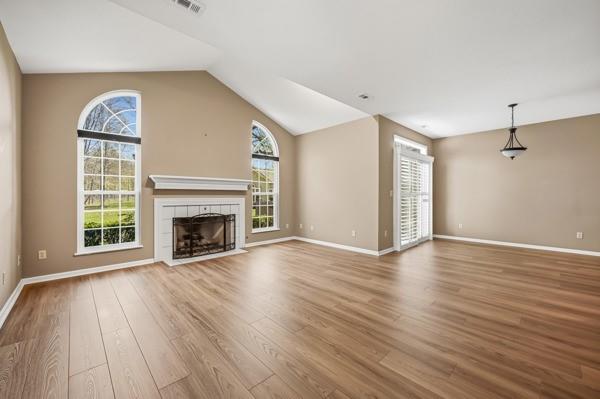 19 Stone Ridge Boulevard Hermitage, PA 16148 - Photo 11 of 40 Living room opens to dining area with sliding doors to back deck