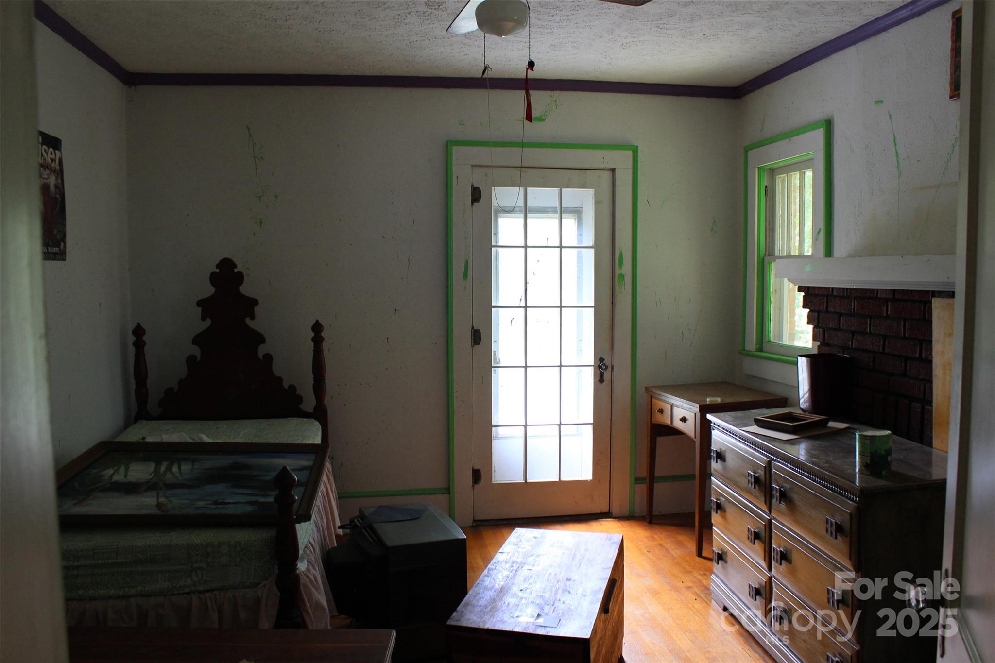 158 School House Road Mills River, NC 28759 - Photo 13 of 22 a bedroom with furniture and a window