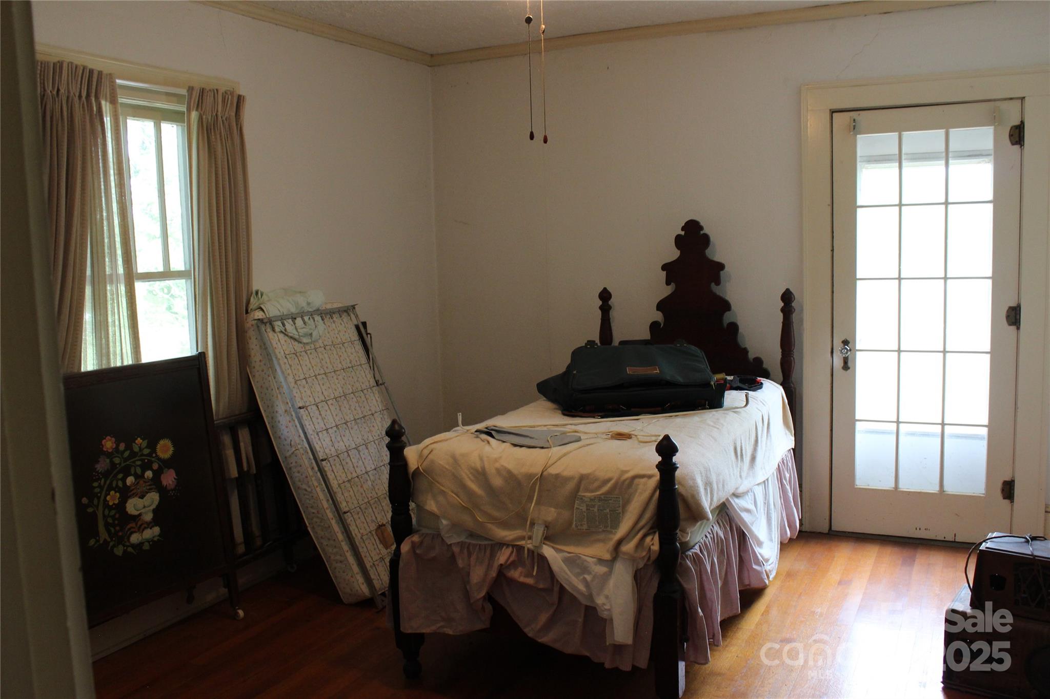 158 School House Road Mills River, NC 28759 - Photo 15 of 22 a bedroom with a bed and a window