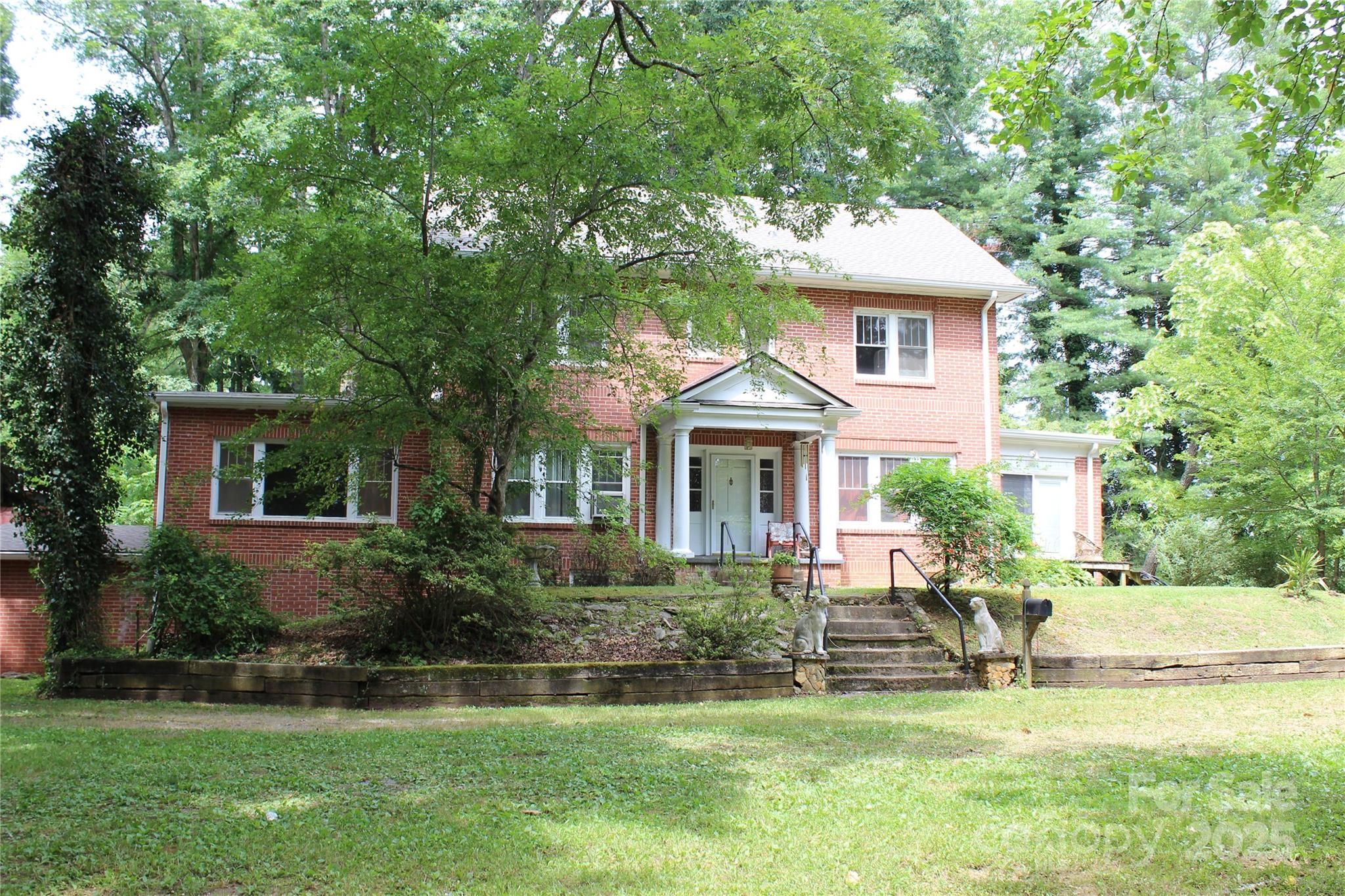 158 School House Road Mills River, NC 28759 - Photo 2 of 22 a front view of house with yard and green space