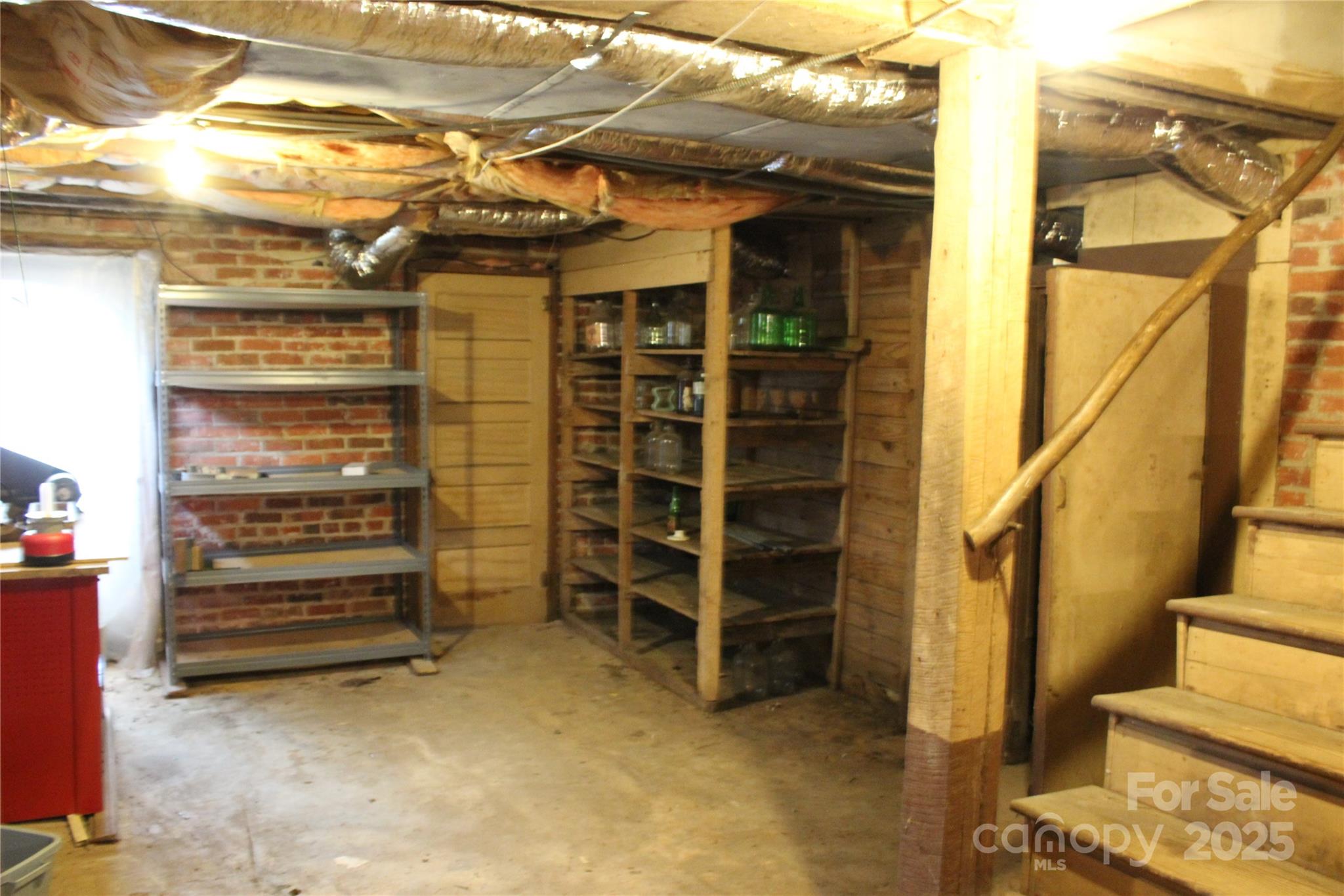 158 School House Road Mills River, NC 28759 - Photo 22 of 22 a view of walk in closet with empty racks