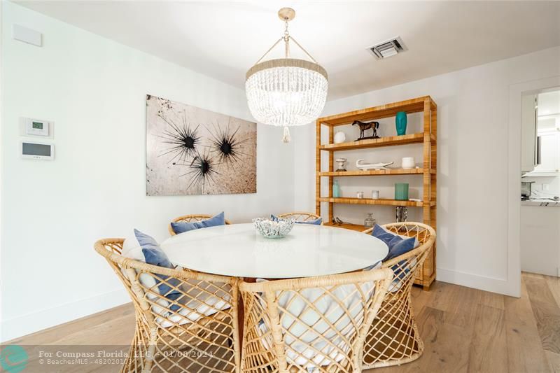 2375 Northeast 29th Street Lighthouse Point, FL 33064 - Photo 15 of 76 a dining room with furniture and window