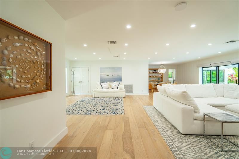 2375 Northeast 29th Street Lighthouse Point, FL 33064 - Photo 22 of 76 a living room with a couch and a coffee table