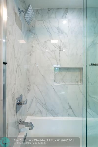 2375 Northeast 29th Street Lighthouse Point, FL 33064 - Photo 34 of 76 a bathroom with a shower