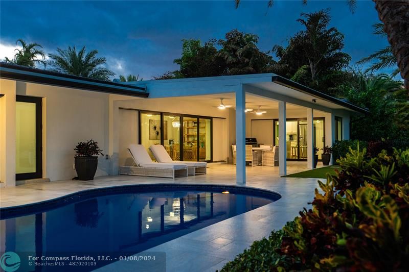 2375 Northeast 29th Street Lighthouse Point, FL 33064 - Photo 55 of 76 a view of swimming pool with outdoor seating
