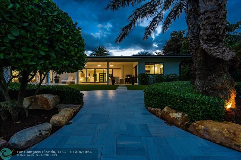 2375 Northeast 29th Street Lighthouse Point, FL 33064 - Photo 59 of 76 a view of a house with backyard and garden