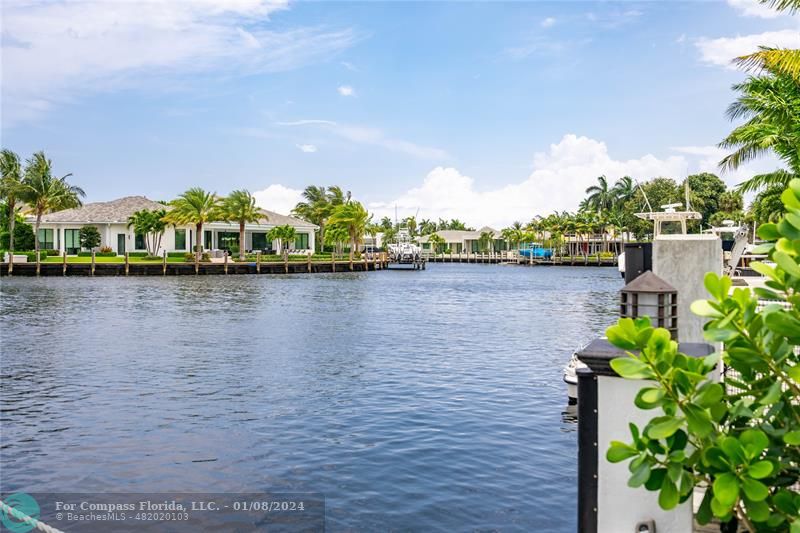2375 Northeast 29th Street Lighthouse Point, FL 33064 - Photo 68 of 76 a view of a lake with a building in the background
