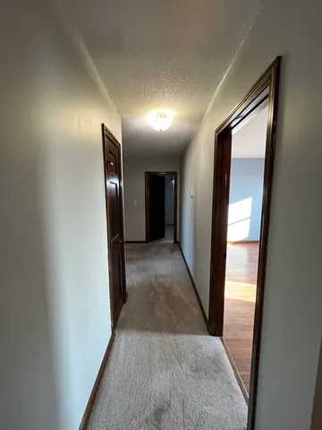 a view of hallway with stairs