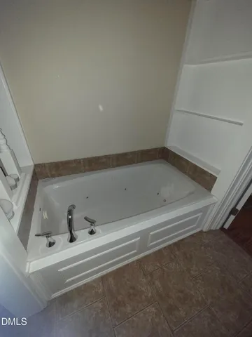 a bathroom with a tub