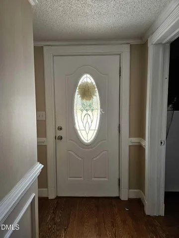 a view of entryway with wooden floor