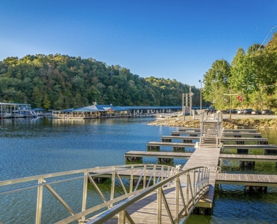 324 Evans Drive Tullahoma, TN 37388 - Photo 2 of 53 a view of a lake with a deck