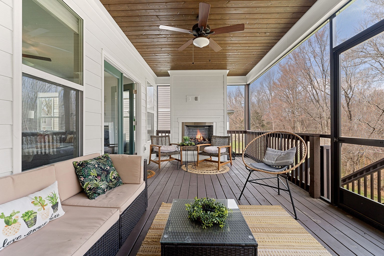 324 Evans Drive Tullahoma, TN 37388 - Photo 22 of 53 a view of a patio with couches table and chairs and wooden floor