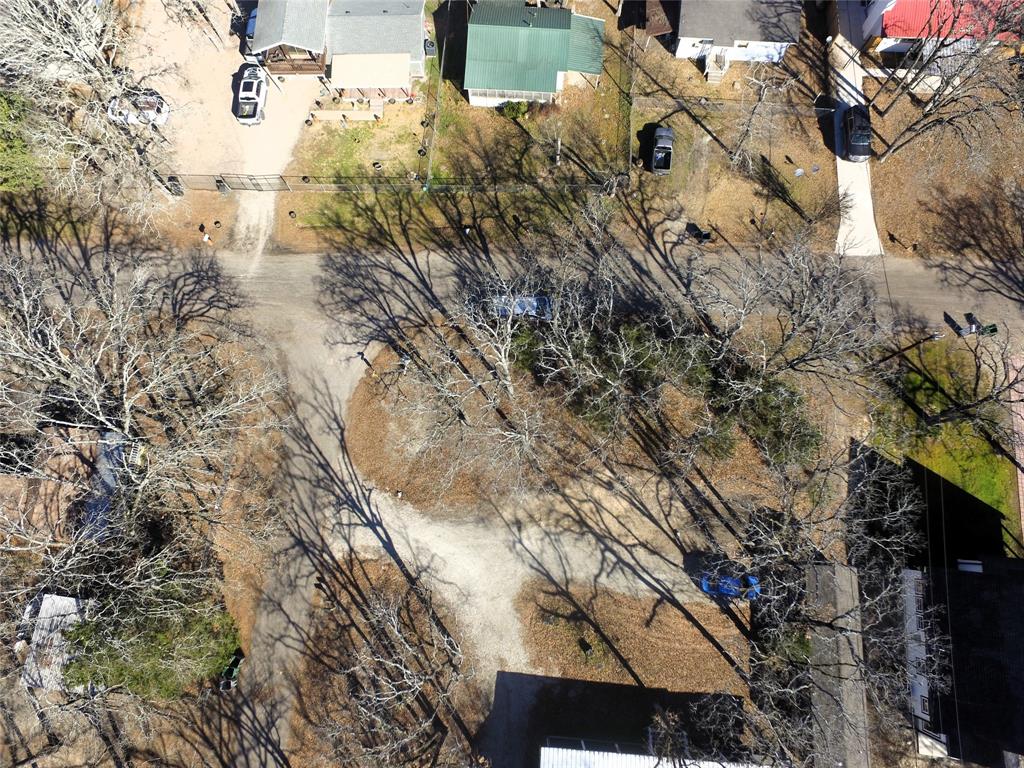 Tbd Live Oak Street Quinlan, TX 75474 - Photo 10 of 16 a aerial view of a house with a yard