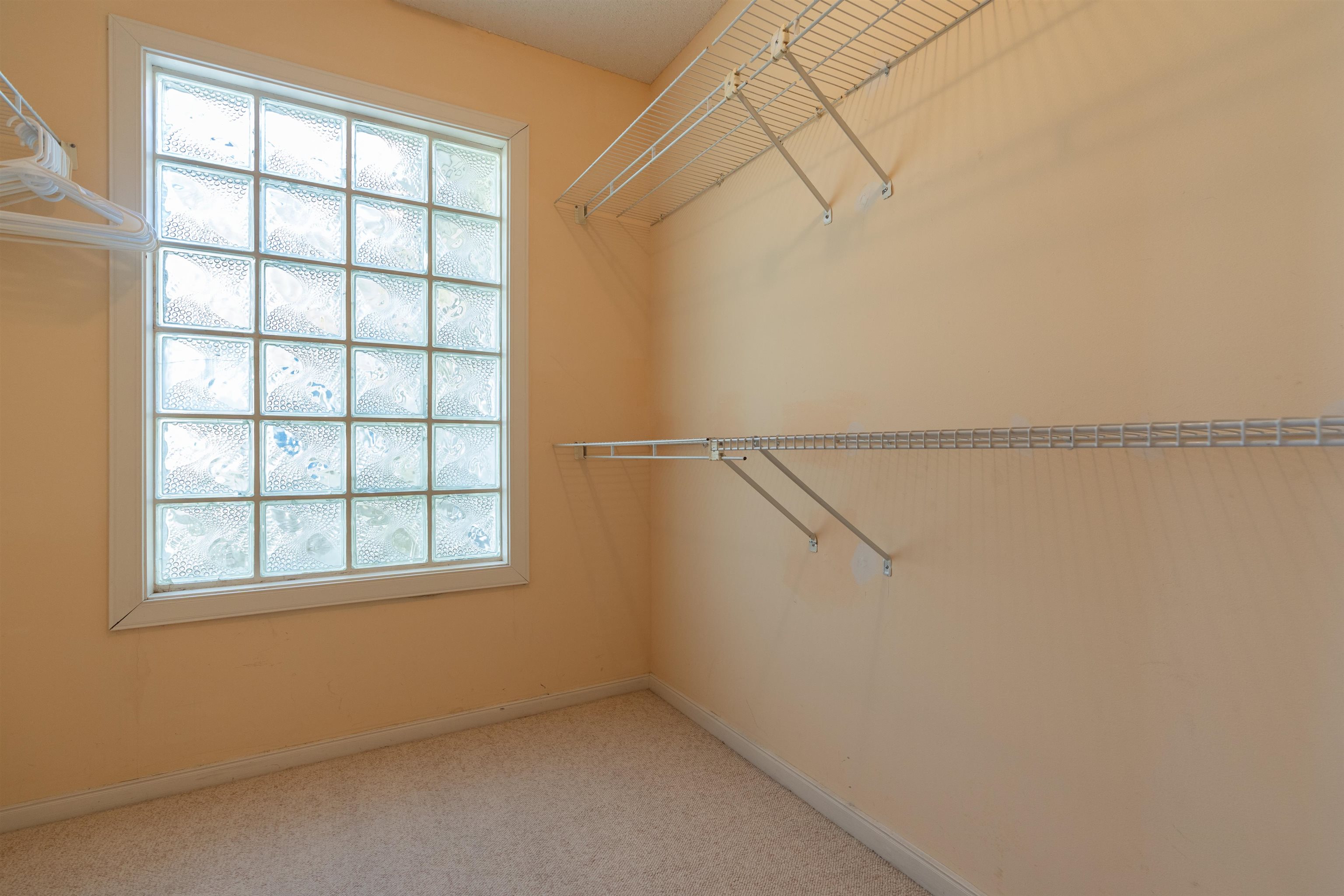 547 Carcaba Road St. Augustine, FL 32084 - Photo 18 of 42 an empty room with a empty space and window