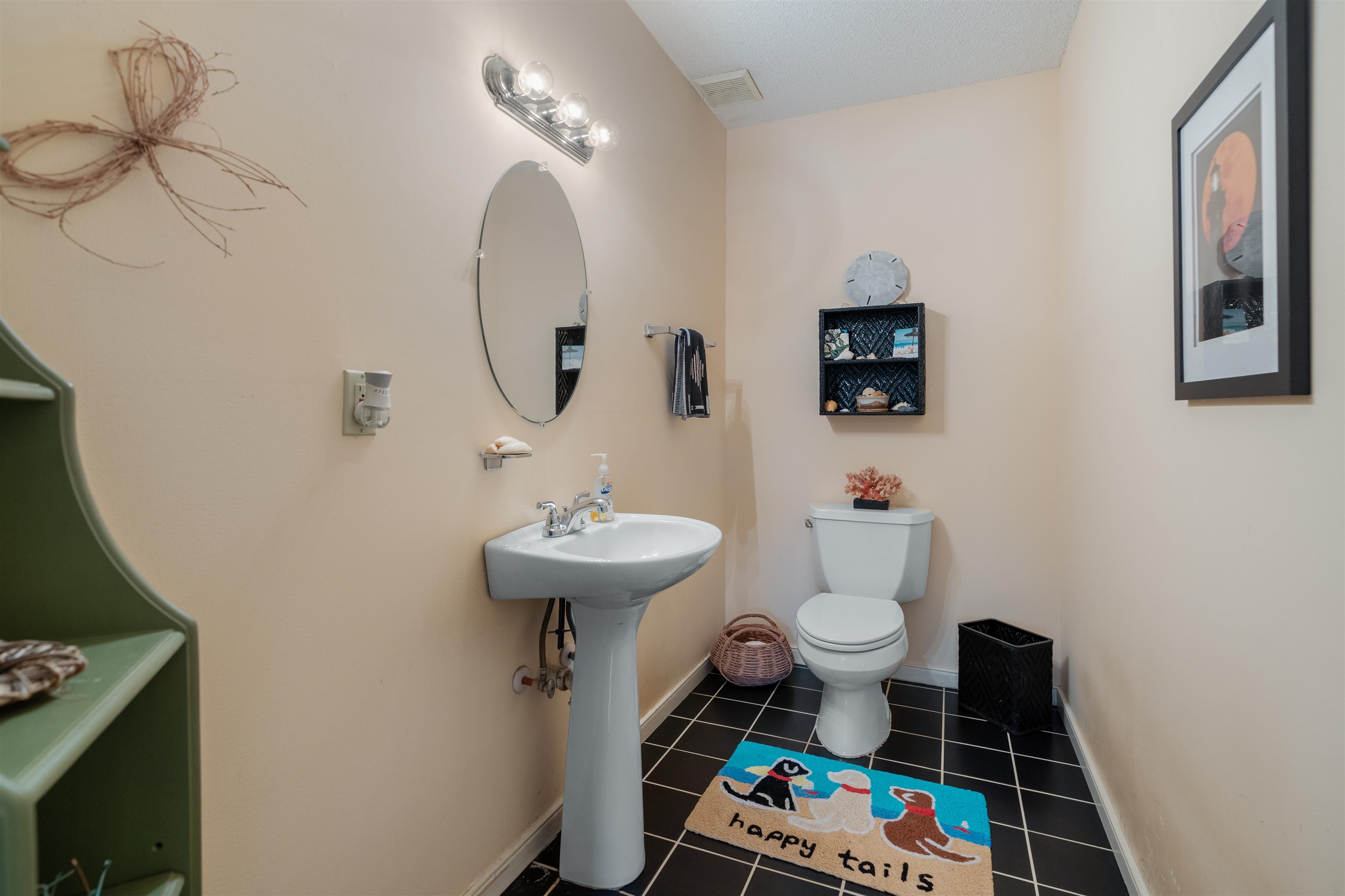 547 Carcaba Road St. Augustine, FL 32084 - Photo 24 of 42 a bathroom with a toilet sink and mirror