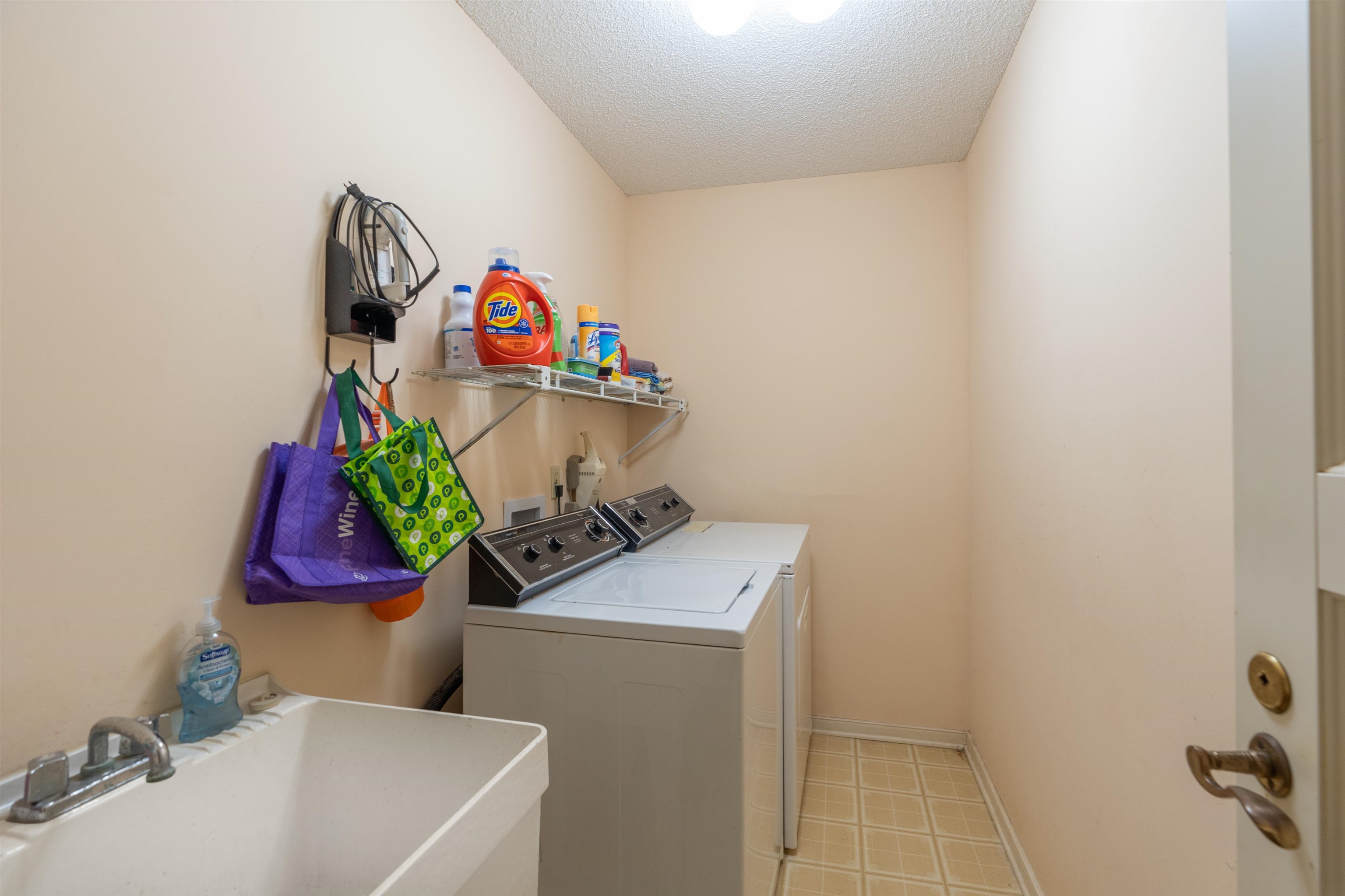 547 Carcaba Road St. Augustine, FL 32084 - Photo 25 of 42 a bathroom with a sink mirror and vanity