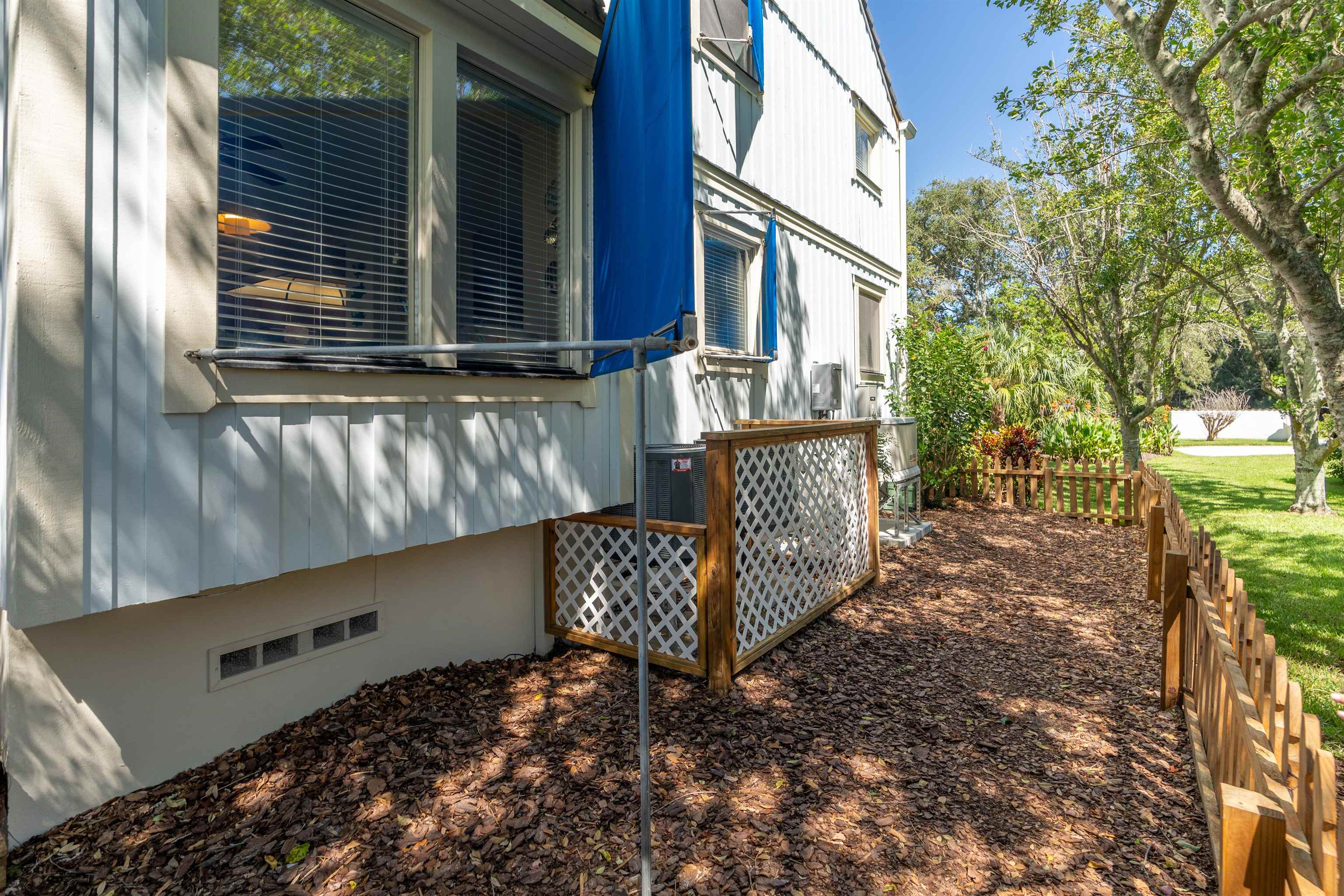 547 Carcaba Road St. Augustine, FL 32084 - Photo 28 of 42 a front view of a house with a yard