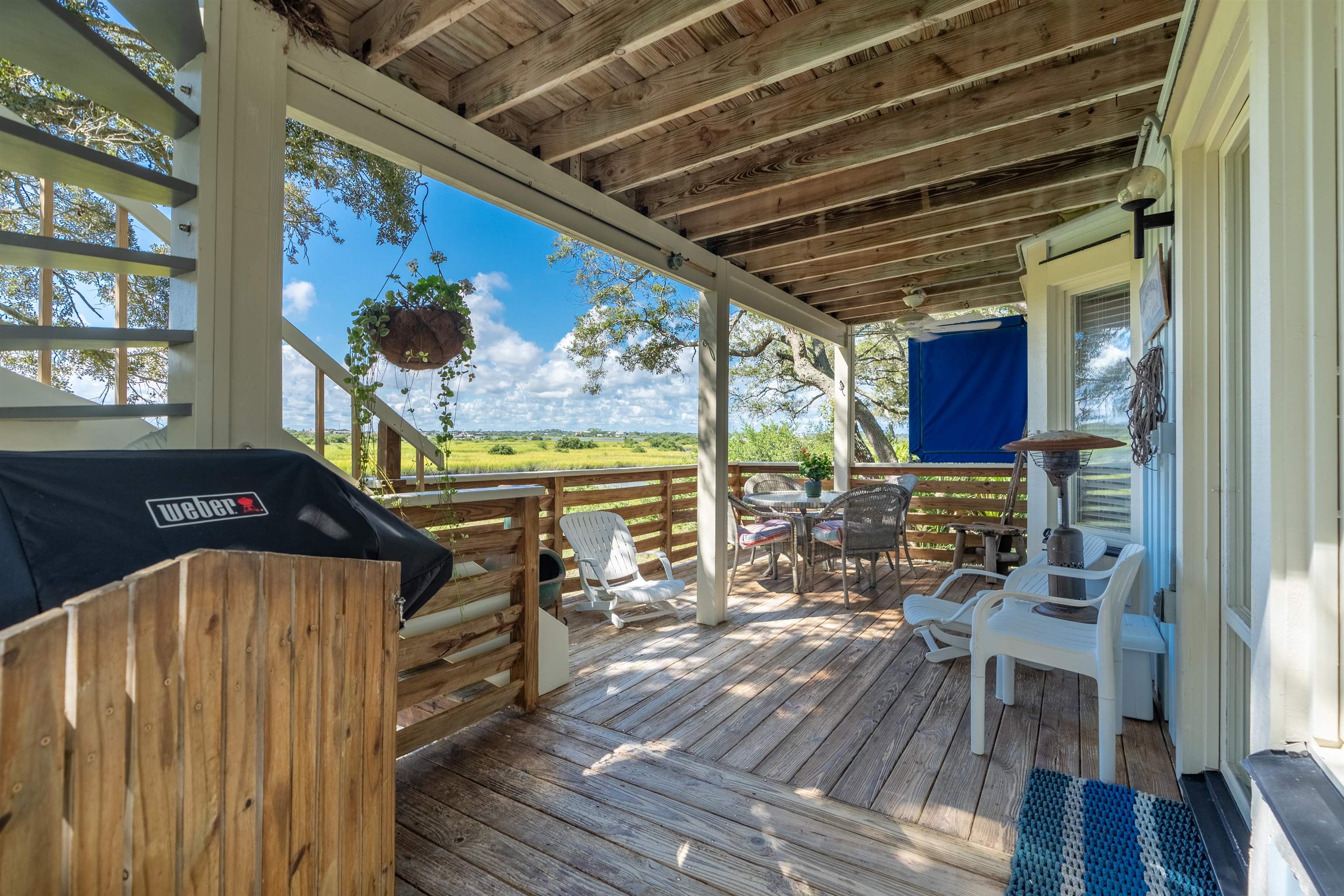 547 Carcaba Road St. Augustine, FL 32084 - Photo 37 of 42 a view of a chairs and table in a patio
