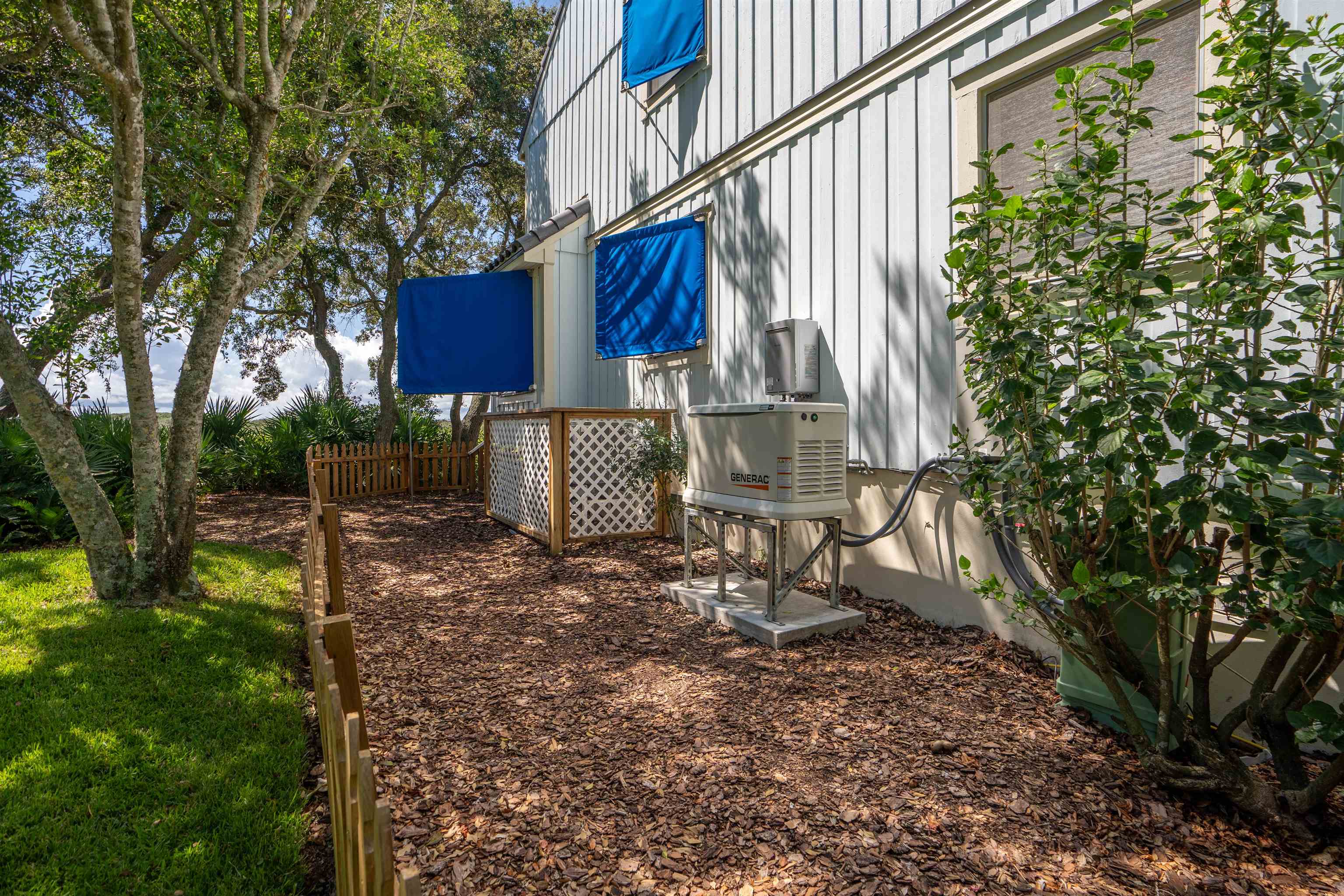 547 Carcaba Road St. Augustine, FL 32084 - Photo 39 of 42 a view of a house with a yard and sitting area