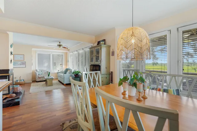a view of a living room and dining room
