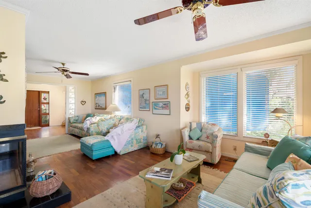 a living room with furniture and window