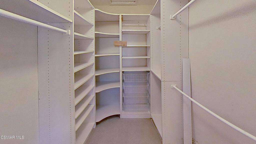 205 Larkhill Street Thousand Oaks, CA 91360 - Photo 16 of 26 a view of walk in closet with empty racks