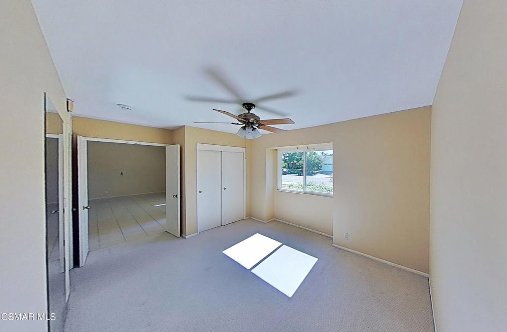 205 Larkhill Street Thousand Oaks, CA 91360 - Photo 17 of 26 wooden floor in an empty room with a window