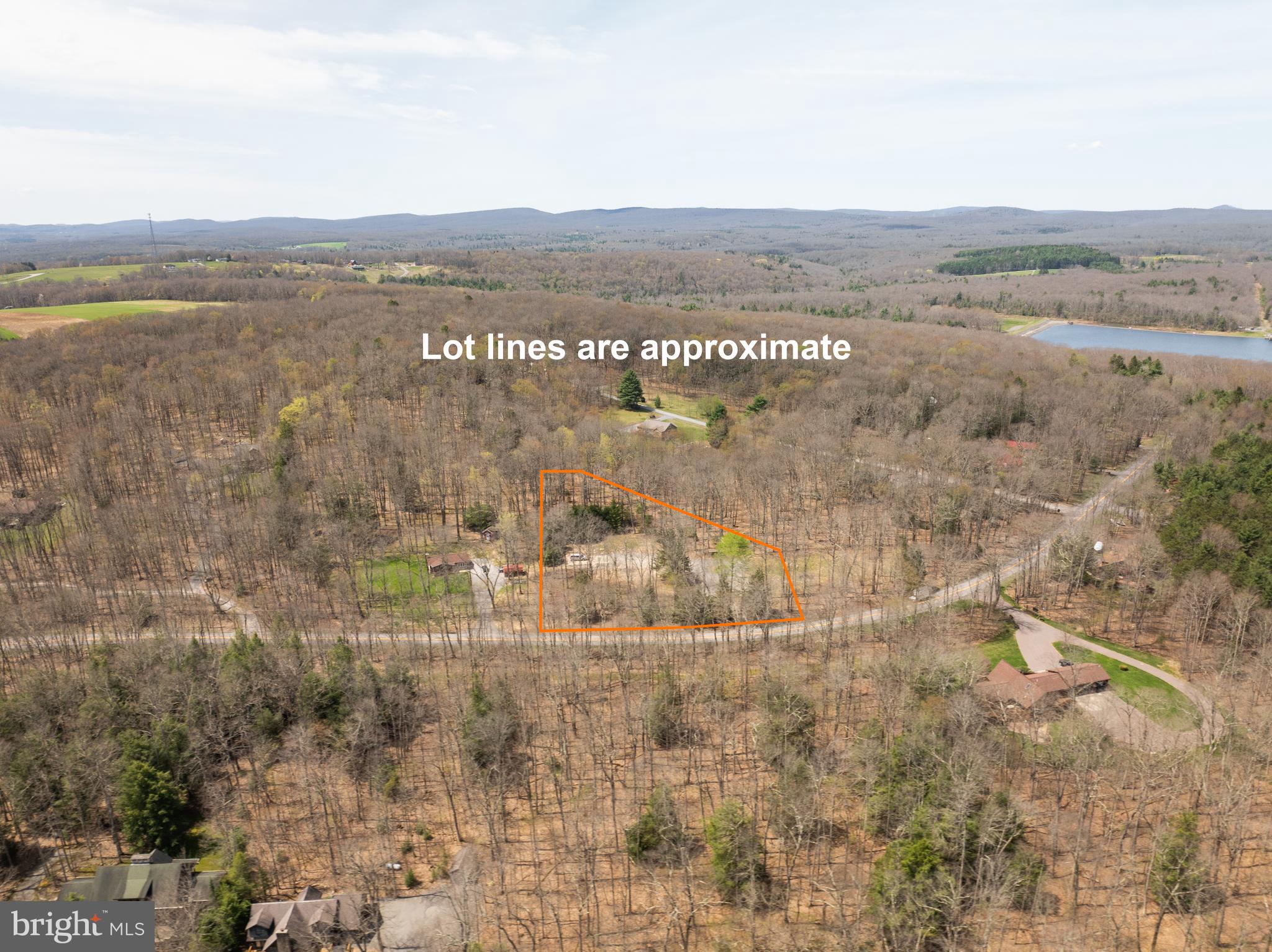 1714 Mayhew Inn Road Oakland, MD 21550 - Photo 3 of 23 a view of lake with mountain view