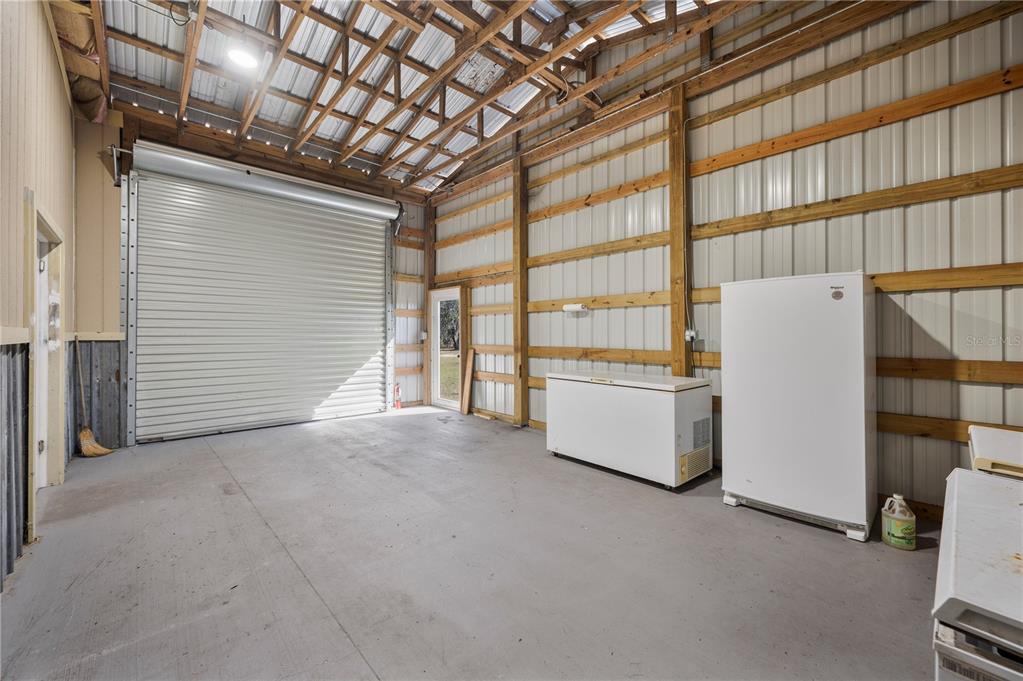 4900 J Jackson Road Fort Meade, FL 33841 - Photo 47 of 97 a view of an empty room with a balcony