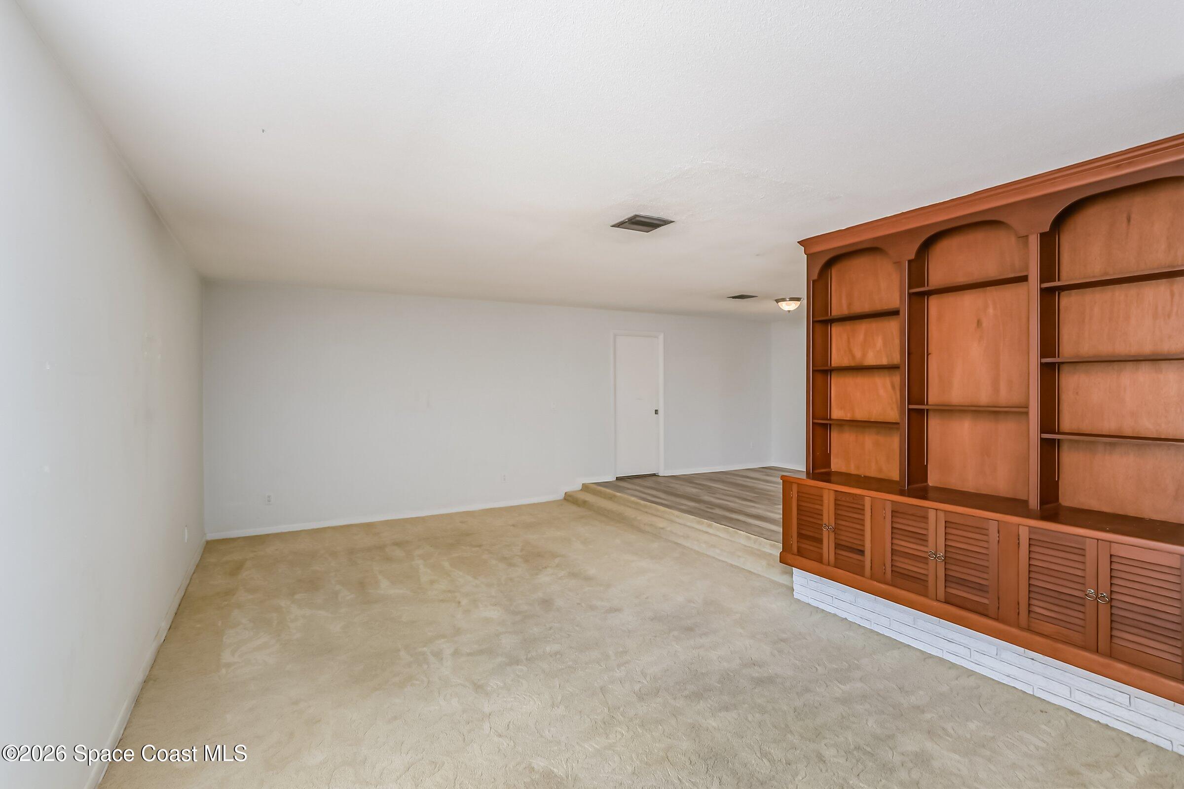 1275 Troon Way Rockledge, FL 32955 - Photo 17 of 61 a view of an empty room