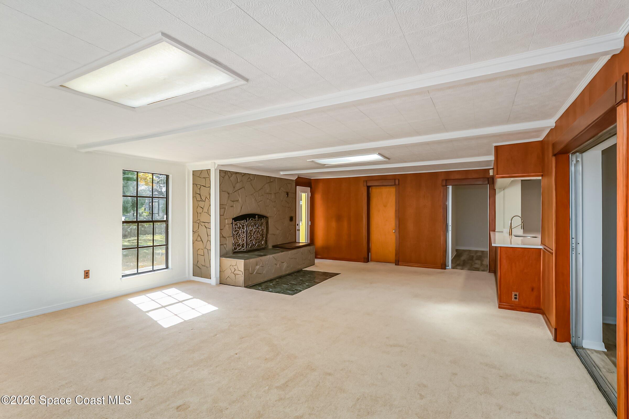1275 Troon Way Rockledge, FL 32955 - Photo 25 of 61 a view of an empty room with a window