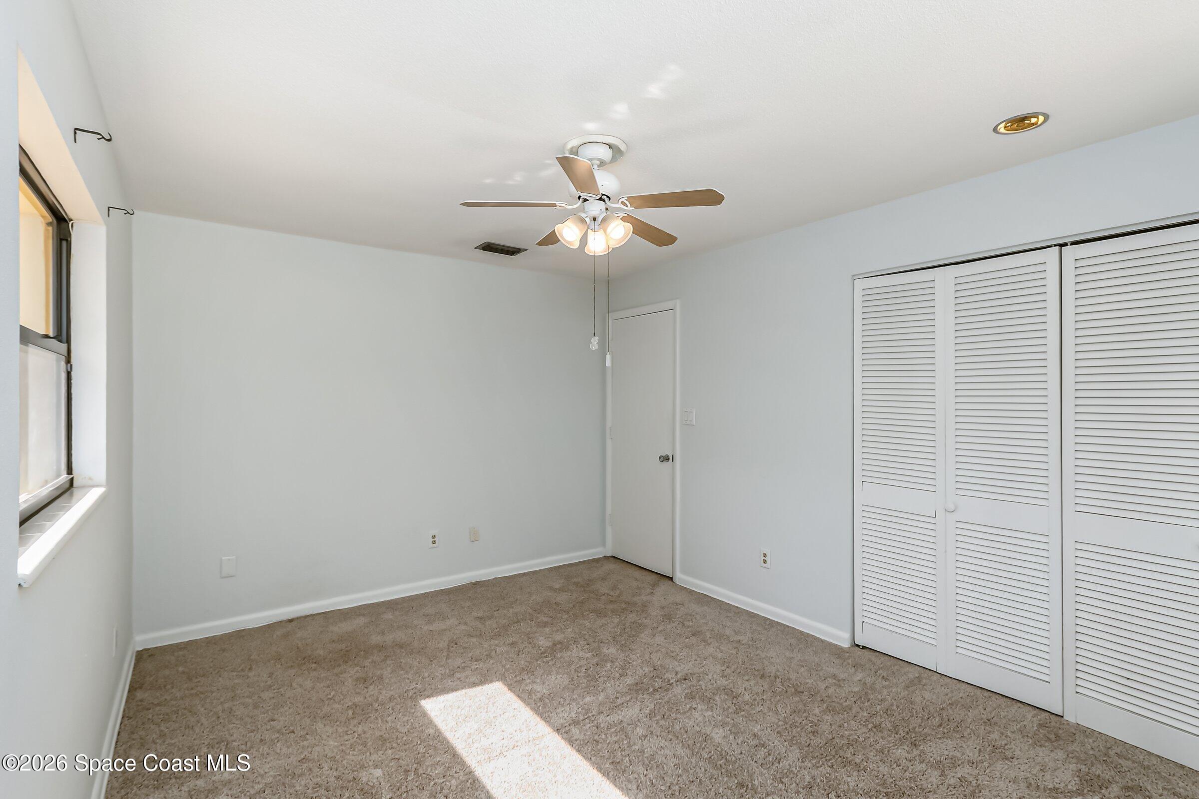 1275 Troon Way Rockledge, FL 32955 - Photo 36 of 61 a view of an empty room