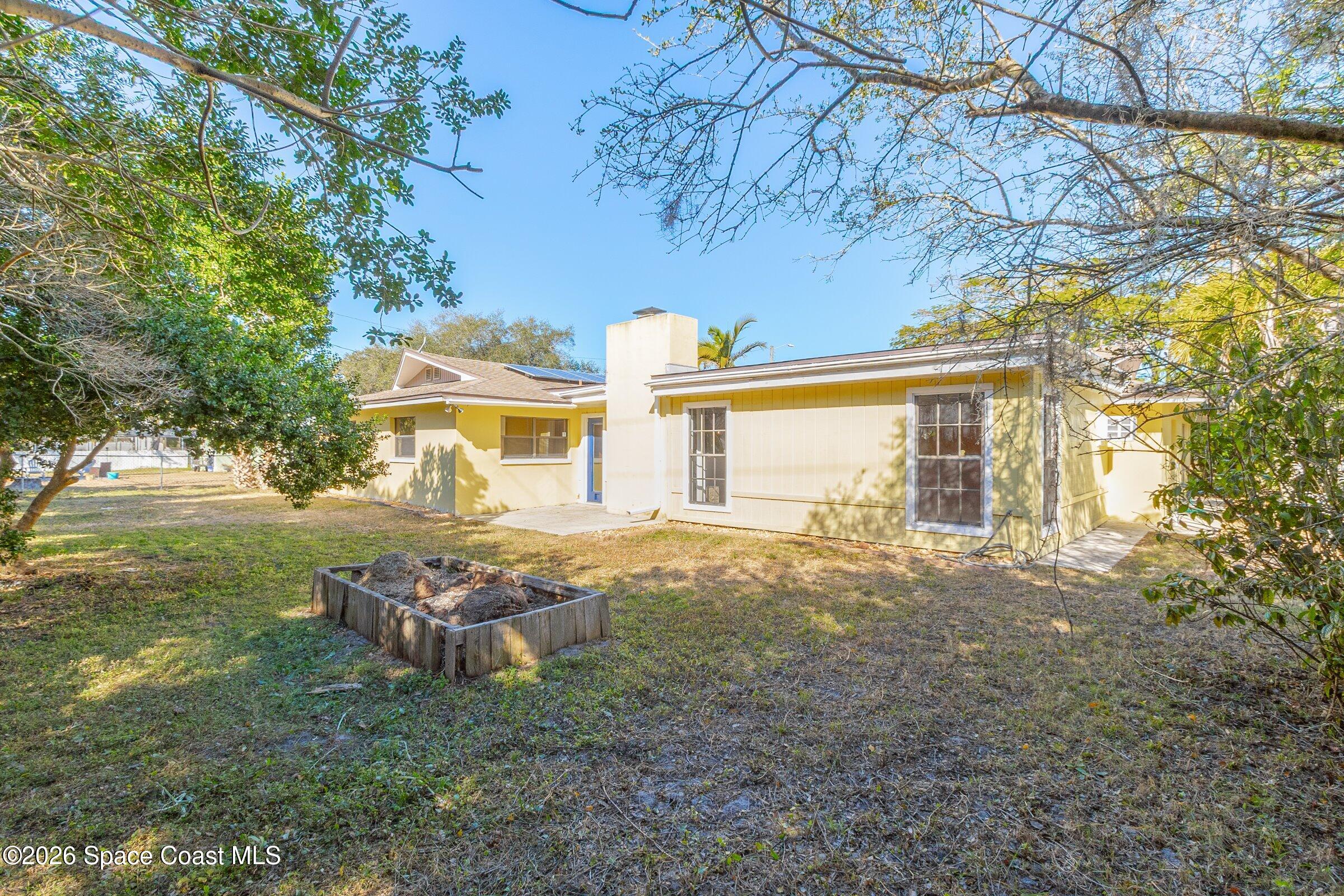 1275 Troon Way Rockledge, FL 32955 - Photo 47 of 61 a view of a house with backyard