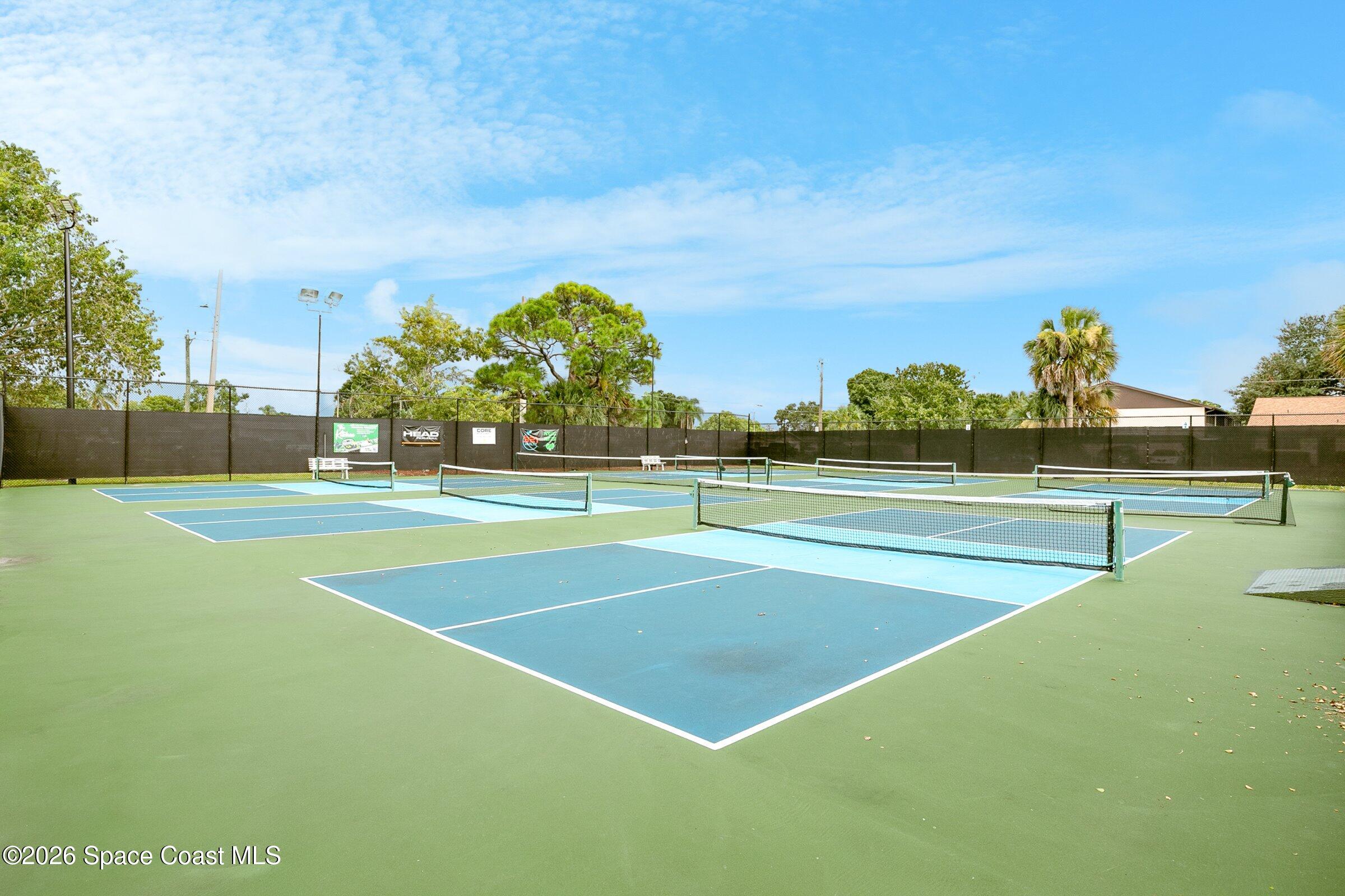 1275 Troon Way Rockledge, FL 32955 - Photo 52 of 61 a view of an outdoor space and tennis court